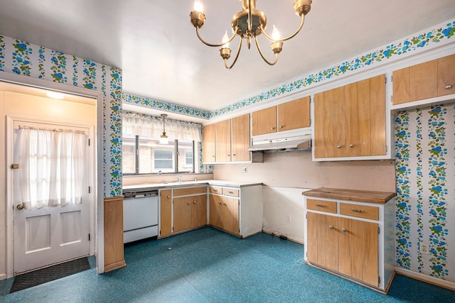 kitchen with white dishwasher, decorative light fixtures, a wealth of natural light, and an inviting chandelier