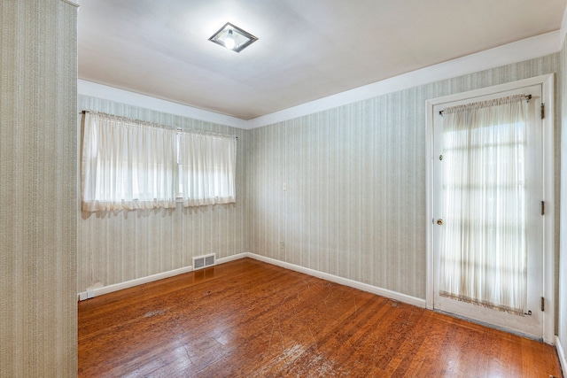 empty room with wood-type flooring