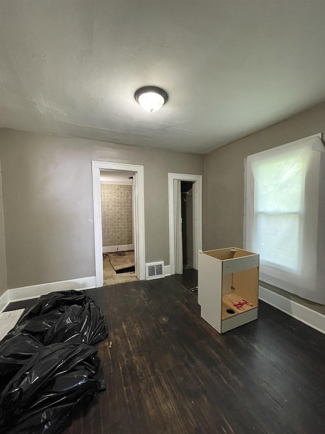 2734 Cumings Ave, Flint, MI 48503 - spare room featuring hardwood / wood-style floors and baseboards