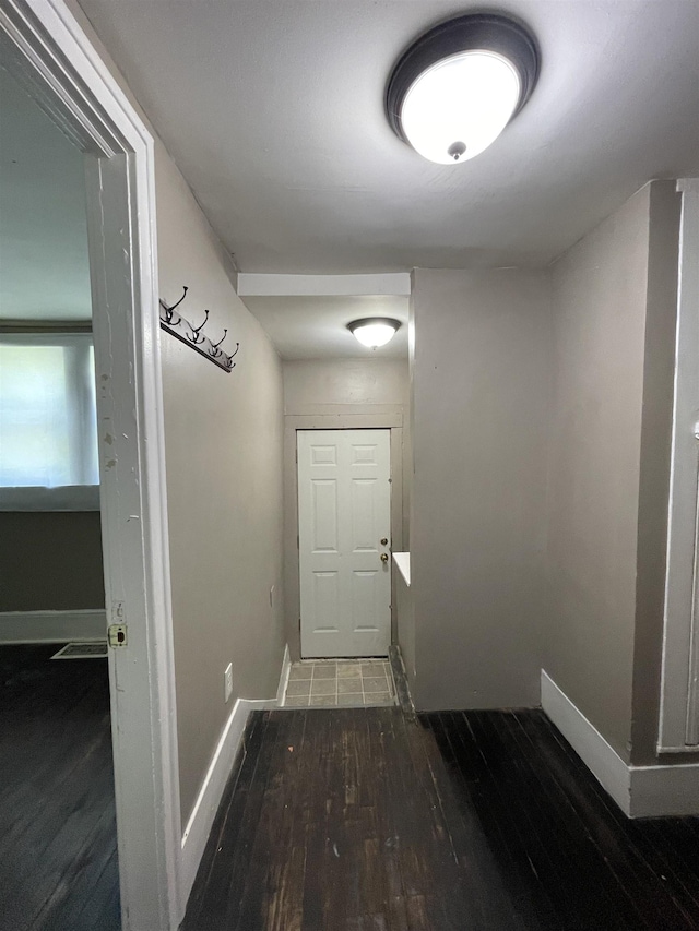 2734 Cumings Ave, Flint, MI 48503 - doorway featuring wood finished floors and baseboards