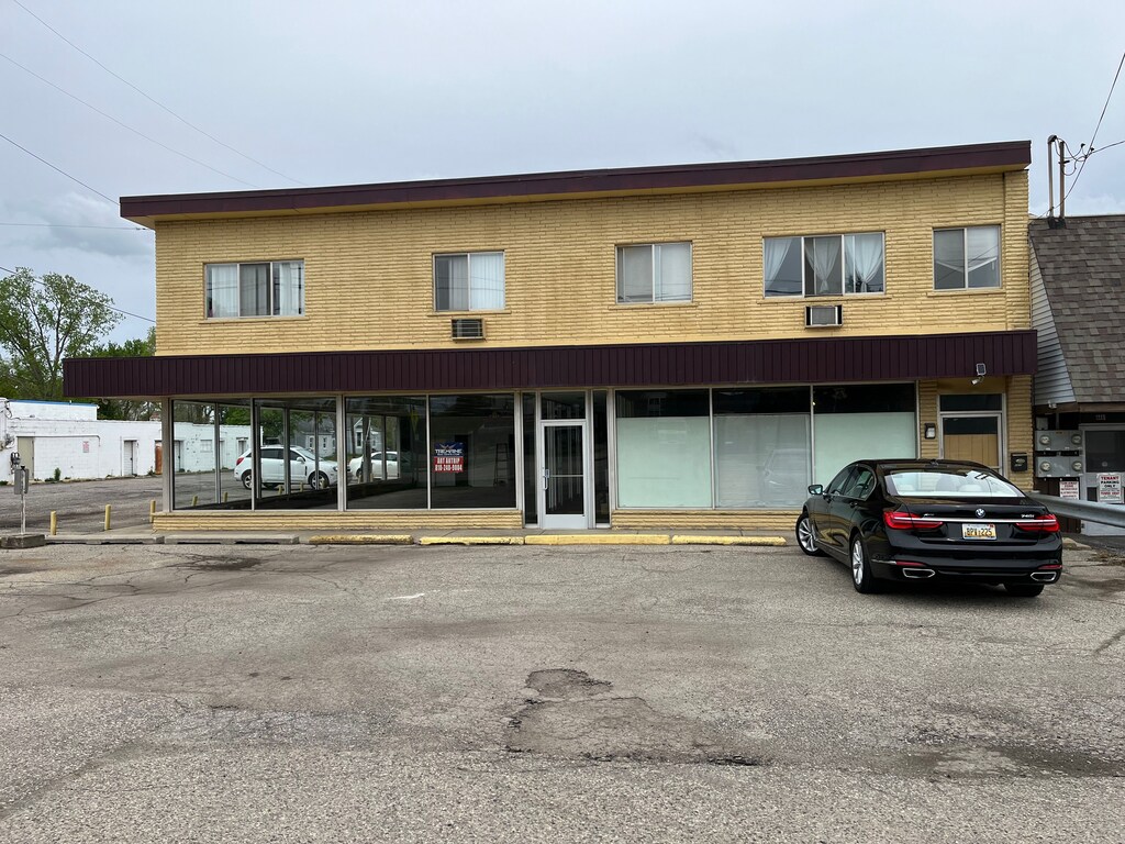 4475 Richfield Rd, Flint, MI 48506 - view of building exterior with uncovered parking
