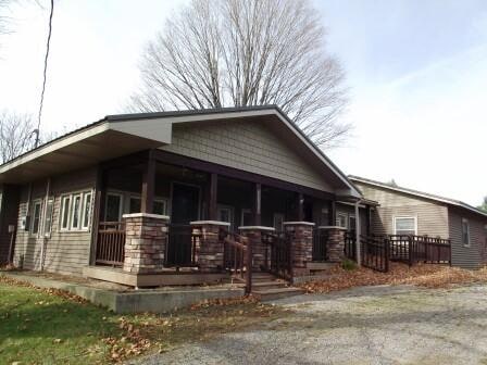 view of home's exterior featuring covered porch