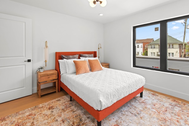 bedroom featuring hardwood / wood-style flooring