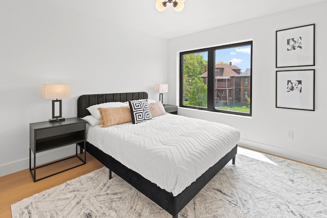 bedroom featuring light wood-type flooring