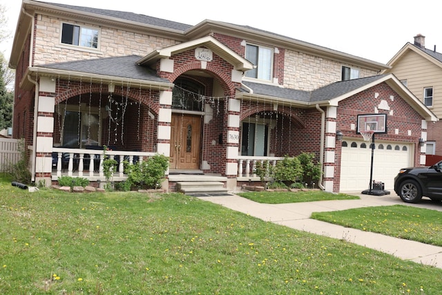 view of front of property featuring a garage, covered porch, and a front lawn