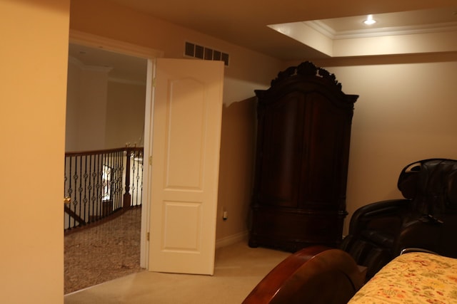 carpeted bedroom featuring crown molding