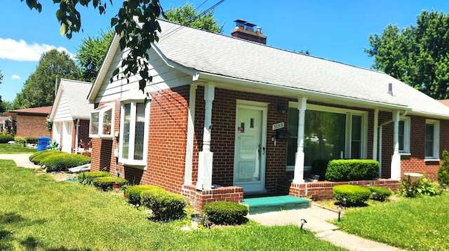 view of front of home with a front yard