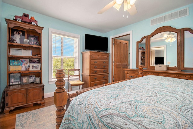 bedroom featuring ceiling fan and hardwood / wood-style floors