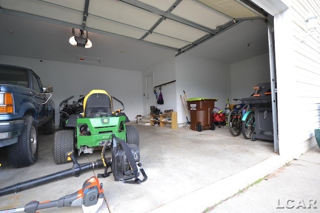 garage featuring a garage door opener