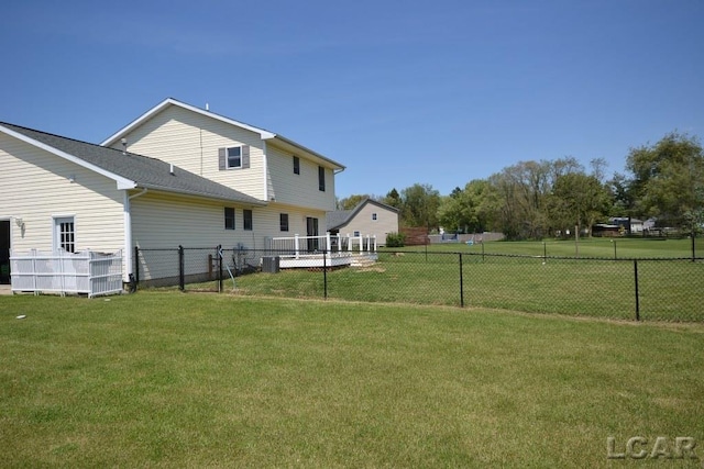 view of yard with central air condition unit