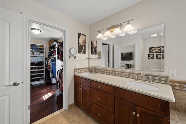 bathroom featuring vanity and wood-type flooring