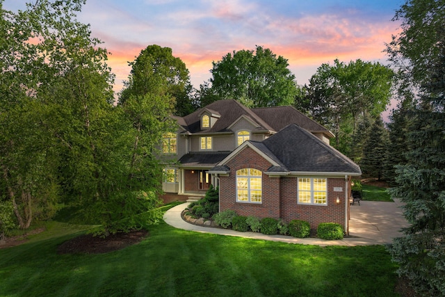 view of front of home with a yard