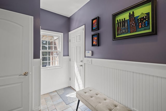 doorway featuring light tile patterned floors