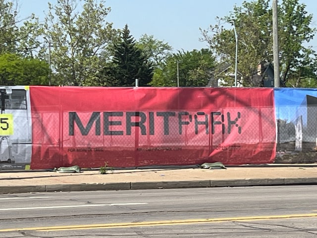 view of community sign