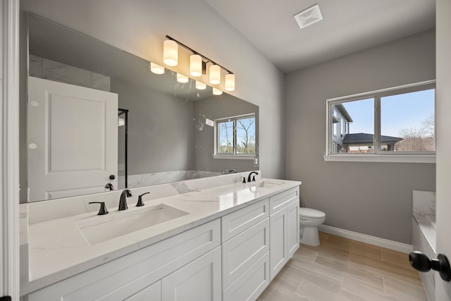 35873 Glenville Dr, New Baltimore, MI 48047 - bathroom featuring a sink, visible vents, toilet, and double vanity