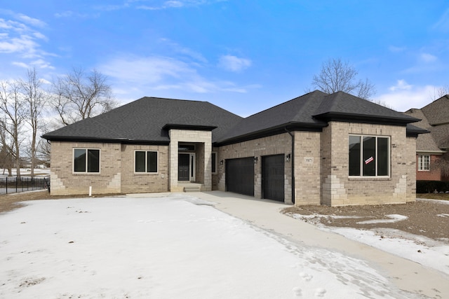 view of front of home with a garage