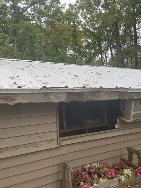 5042 Jeffers St, Irons, MI 49644 - exterior view of metal roof