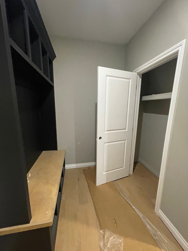 mudroom with hardwood / wood-style flooring