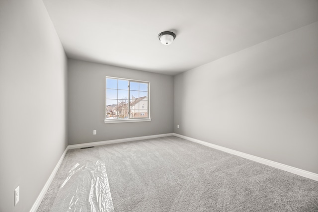 view of carpeted spare room