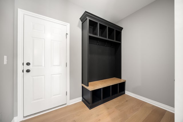 mudroom with hardwood / wood-style flooring