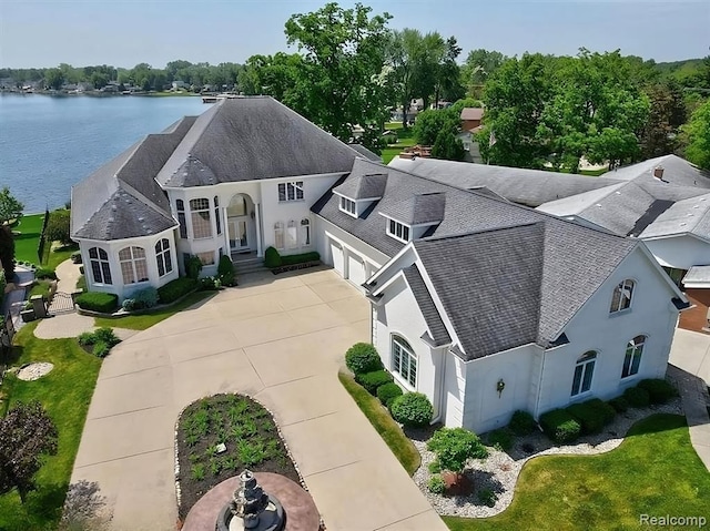 birds eye view of property featuring a water view