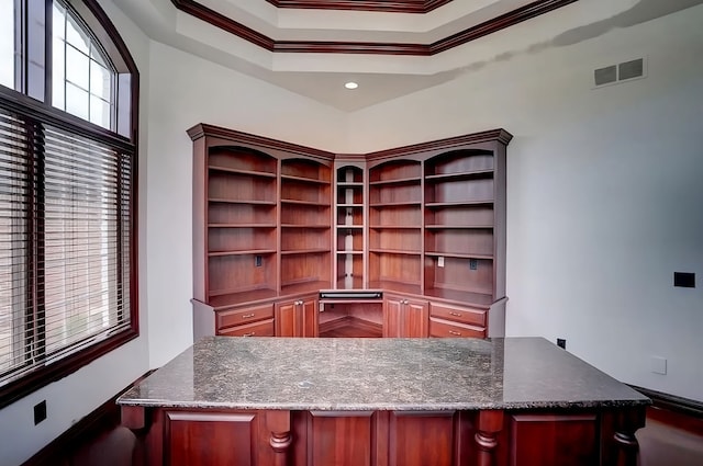 office area featuring ornamental molding and a tray ceiling