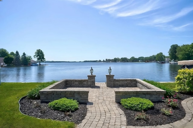 view of patio / terrace with a water view