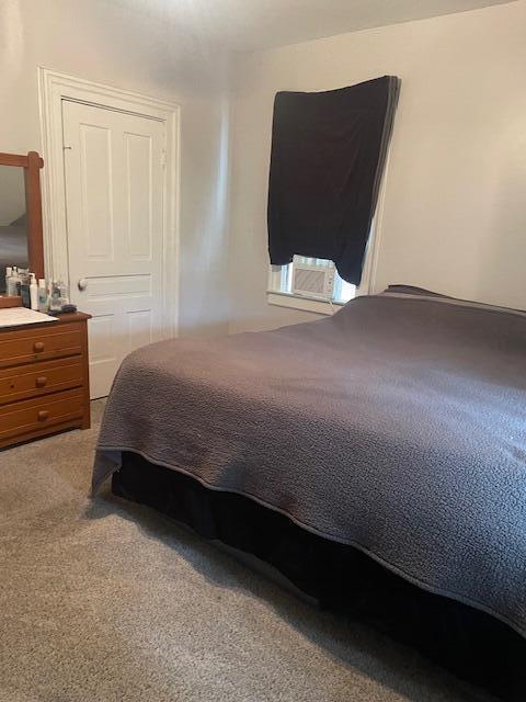 621 E Michigan Ave, Grass Lake, MI 49240 - bedroom featuring carpet and cooling unit