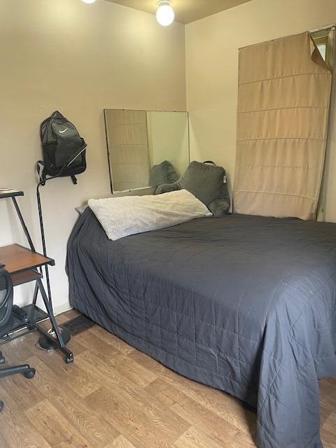 bedroom featuring light wood-type flooring