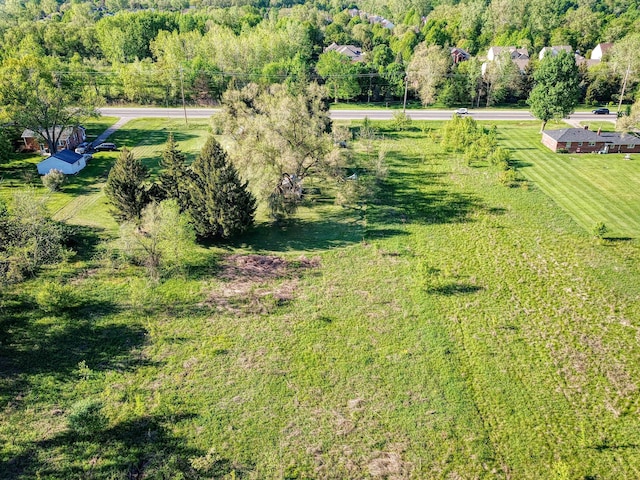 birds eye view of property featuring a rural view