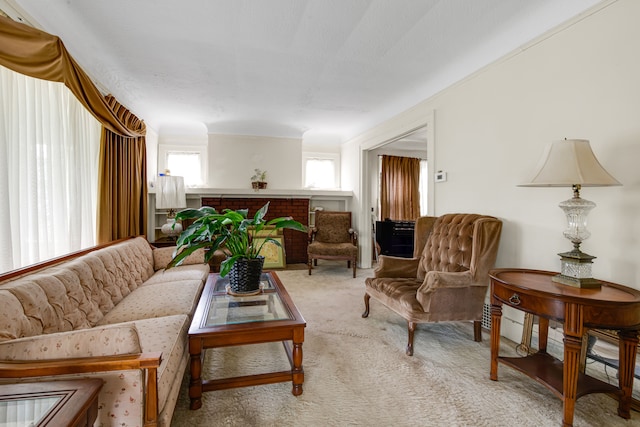 carpeted living room featuring a textured ceiling