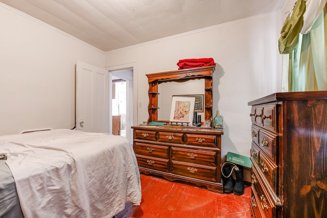 bedroom with multiple windows and crown molding