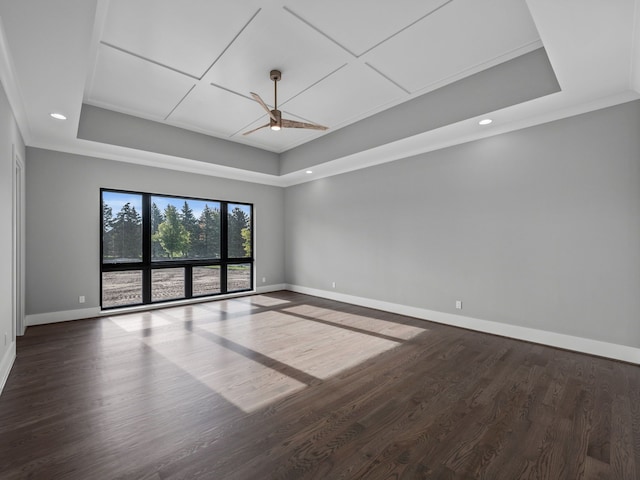 empty room with ceiling fan, wood-type flooring, and ornamental molding