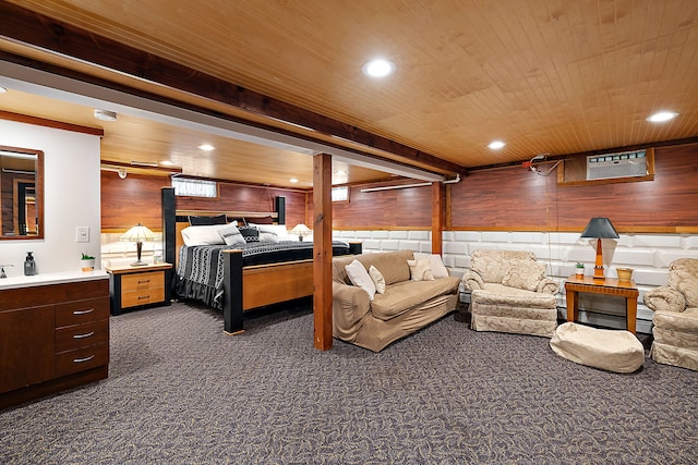 carpeted bedroom featuring a wall mounted air conditioner, wood ceiling, a baseboard heating unit, and wood walls