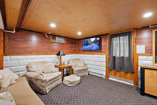 interior space featuring carpet flooring, a wall mounted air conditioner, baseboard heating, wooden ceiling, and wood walls