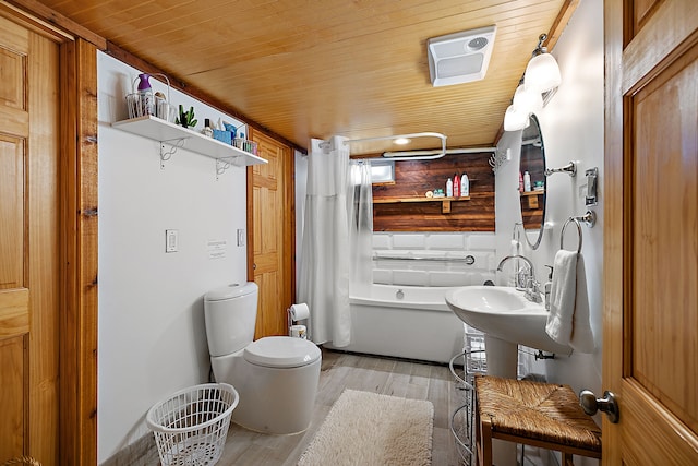 bathroom with shower / bath combo, hardwood / wood-style flooring, toilet, and wooden ceiling