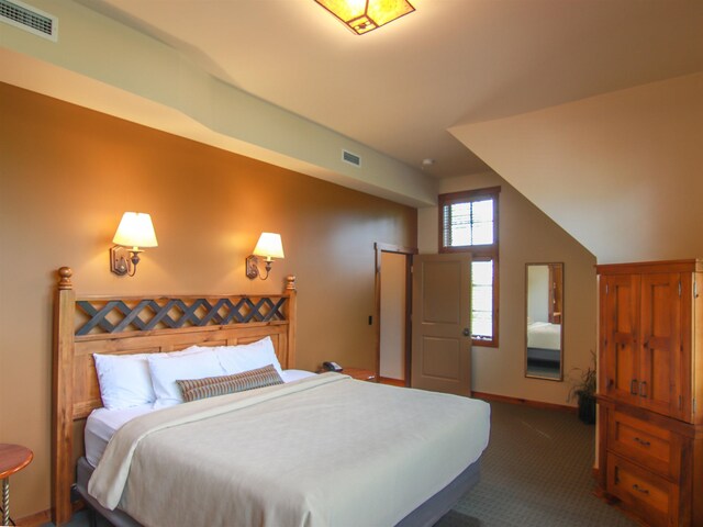 12328-UNIT335B Crystal Mountain Dr, Thompsonville, MI 49683 - full bath featuring toilet, vanity, a shower, and tile patterned floors