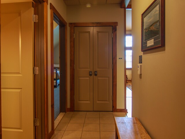 12328-UNIT335B Crystal Mountain Dr, Thompsonville, MI 49683 - hallway with light tile patterned floors