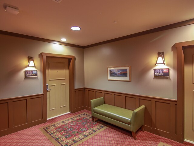 12328-UNIT335B Crystal Mountain Dr, Thompsonville, MI 49683 - sitting room featuring wainscoting, light carpet, a decorative wall, and recessed lighting