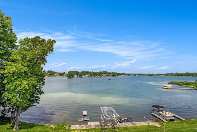 view of water feature with a dock