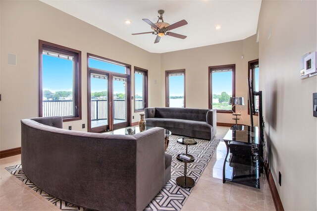 75 Chateaux Du Lac, Fenton, MI 48430 - living room with a ceiling fan, light tile patterned flooring, baseboards, and recessed lighting