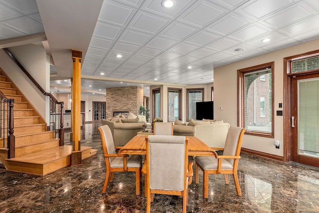 dining area featuring a fireplace