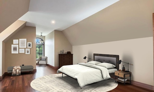 bedroom featuring hardwood / wood-style floors and lofted ceiling