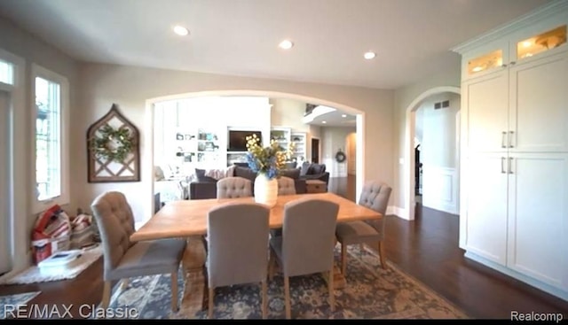 dining area featuring dark hardwood / wood-style flooring