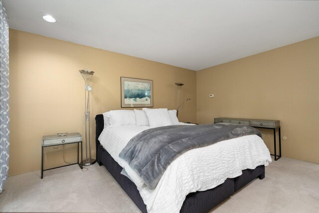 3586 E Huron River Dr, Ann Arbor, MI 48104 - bedroom featuring light carpet