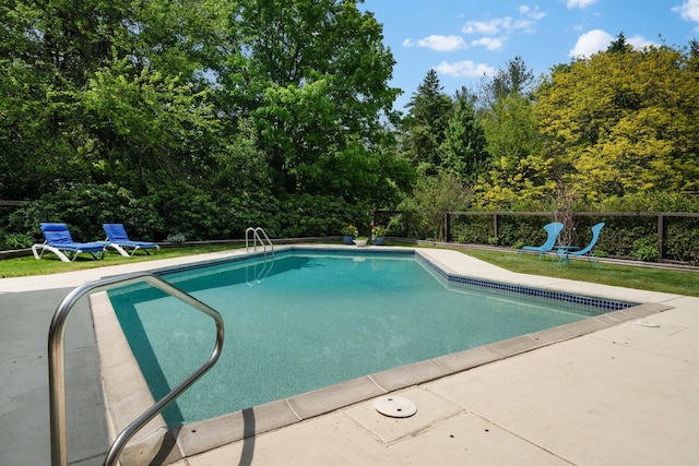 view of swimming pool featuring a patio