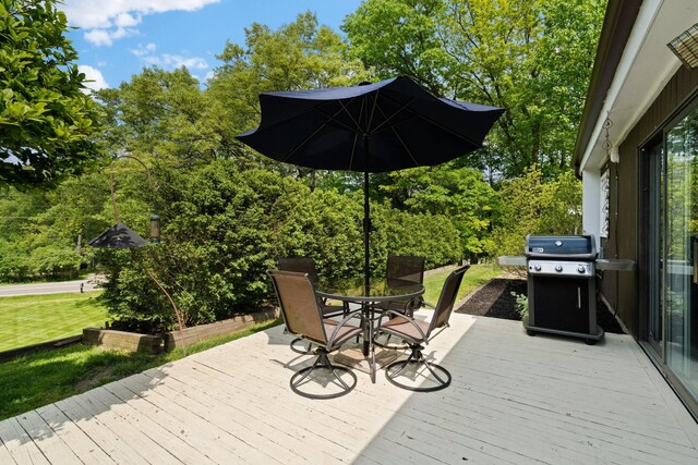 3586 E Huron River Dr, Ann Arbor, MI 48104 - wooden terrace featuring outdoor dining space and a grill