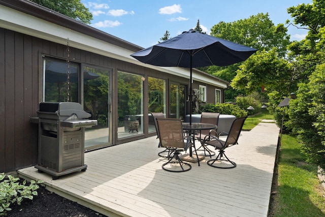 wooden deck featuring grilling area