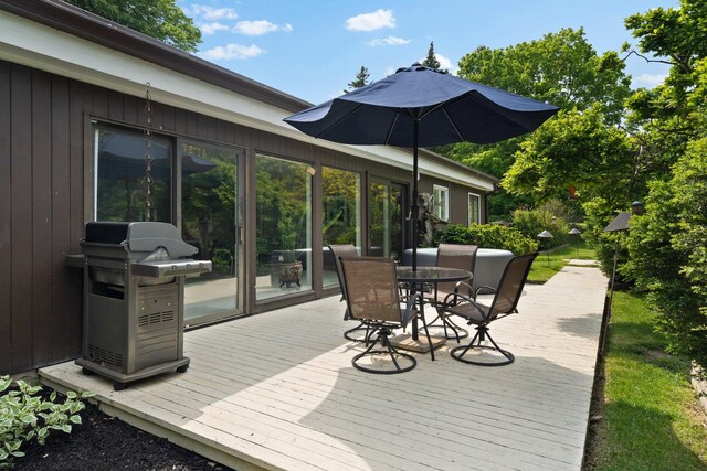 3586 E Huron River Dr, Ann Arbor, MI 48104 - wooden deck with outdoor dining area and grilling area