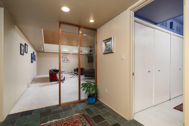 3586 E Huron River Dr, Ann Arbor, MI 48104 - hall featuring recessed lighting, baseboards, and stone finish floors